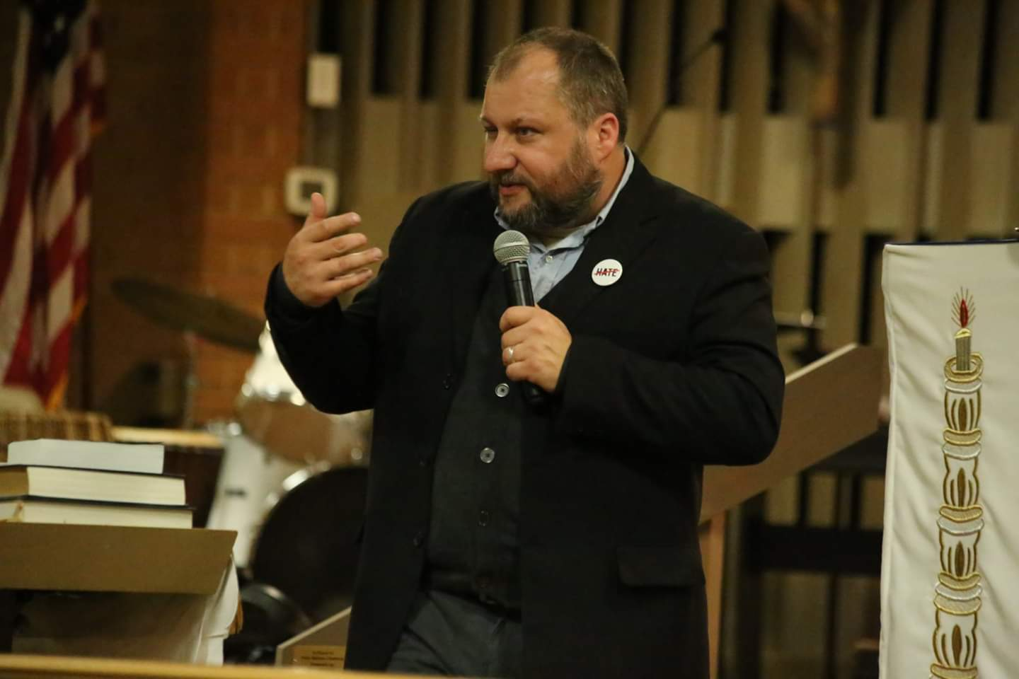 TM Garret speaking with a microphone